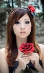 pic for Asian Girl With Red Rose 768x1280